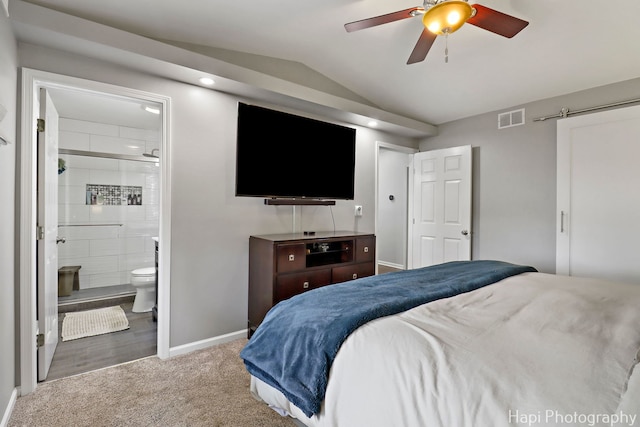 809 W Sheridan Rd, Mchenry, IL 60051 - carpeted bedroom featuring vaulted ceiling and connected bathroom