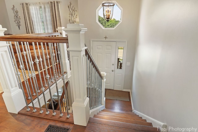 809 W Sheridan Rd, Mchenry, IL 60051 - staircase featuring wood finished floors and baseboards