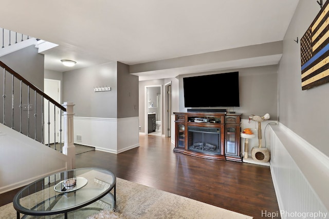 809 W Sheridan Rd, Mchenry, IL 60051 - living room featuring wood finished floors, a wainscoted wall, and stairway