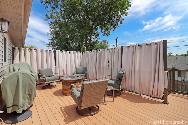809 W Sheridan Rd, Mchenry, IL 60051 - deck featuring a fire pit