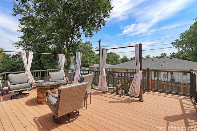 809 W Sheridan Rd, Mchenry, IL 60051 - deck with a fire pit