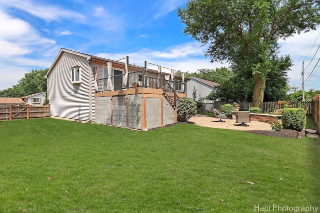 809 W Sheridan Rd, Mchenry, IL 60051 - back of house featuring a fenced backyard, a wooden deck, stairs, and a patio area