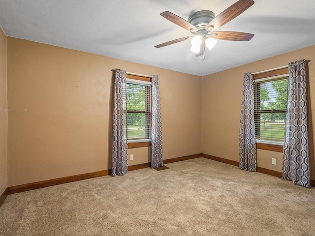 512 S Elida St, Winnebago, IL 61088 - spare room with plenty of natural light, a ceiling fan, and carpet flooring