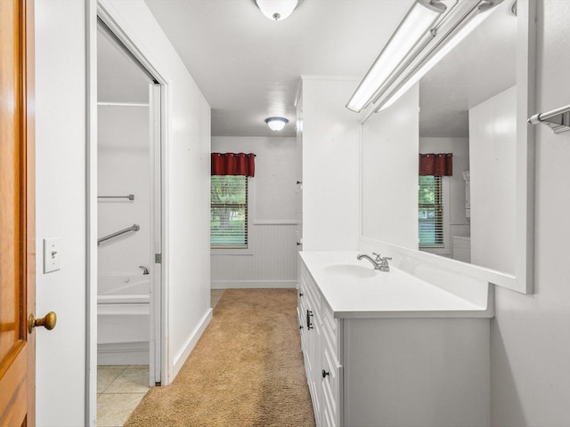 512 S Elida St, Winnebago, IL 61088 - full bath featuring vanity and wainscoting