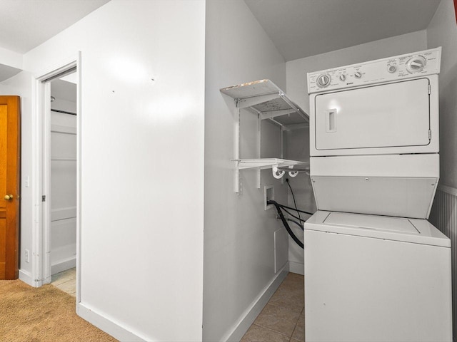 512 S Elida St, Winnebago, IL 61088 - washroom with stacked washer / drying machine and baseboards