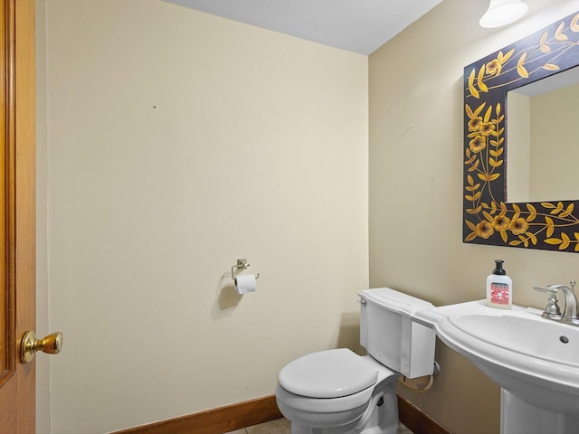 512 S Elida St, Winnebago, IL 61088 - bathroom with toilet and a sink