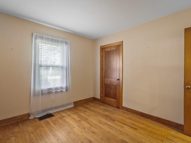 512 S Elida St, Winnebago, IL 61088 - unfurnished room featuring baseboards and light wood-style floors