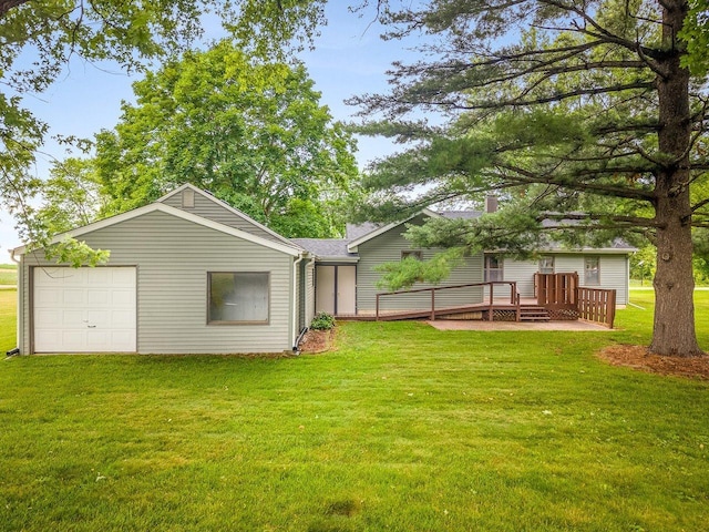 512 S Elida St, Winnebago, IL 61088 - view of grassy yard with a deck