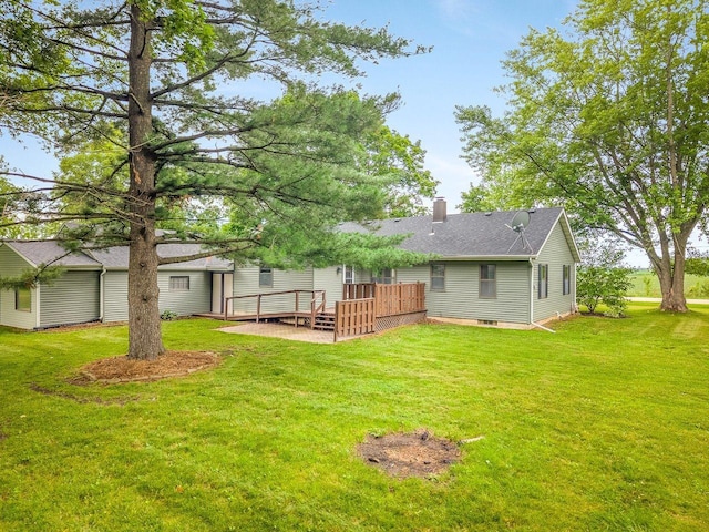 512 S Elida St, Winnebago, IL 61088 - view of grassy yard featuring a wooden deck