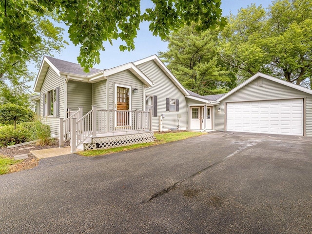 512 S Elida St, Winnebago, IL 61088 - view of front of home featuring driveway and an attached garage