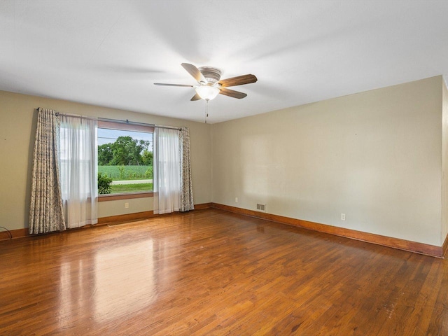 512 S Elida St, Winnebago, IL 61088 - spare room featuring wood finished floors and ceiling fan