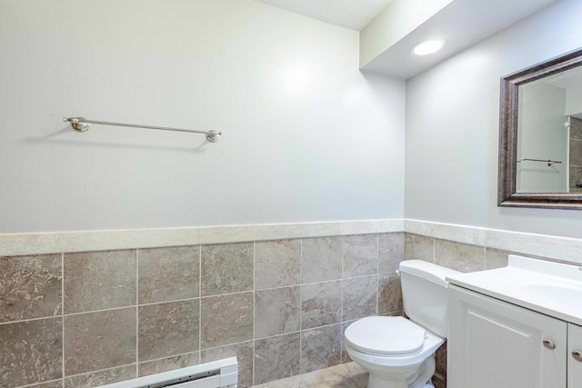 4309 W Park Lane Dr Unit 2B, Alsip, IL 60803 - bathroom featuring vanity, wainscoting, tile walls, and a baseboard radiator