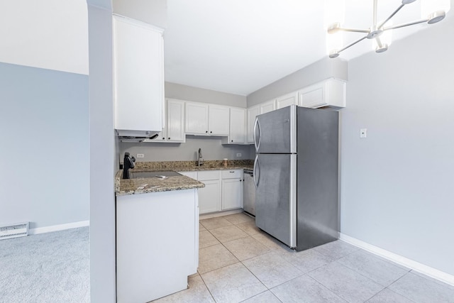 4309 W Park Lane Dr Unit 2B, Alsip, IL 60803 - kitchen featuring freestanding refrigerator, stone countertops, white cabinetry, stove, and light tile patterned floors