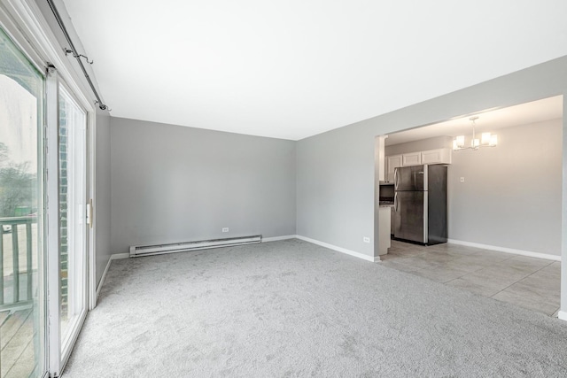 4309 W Park Lane Dr Unit 2B, Alsip, IL 60803 - unfurnished room featuring a baseboard radiator, light carpet, and a chandelier