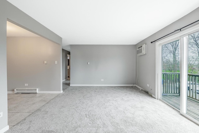 4309 W Park Lane Dr Unit 2B, Alsip, IL 60803 - unfurnished room with carpet flooring, a baseboard radiator, a wall mounted AC, and tile patterned floors