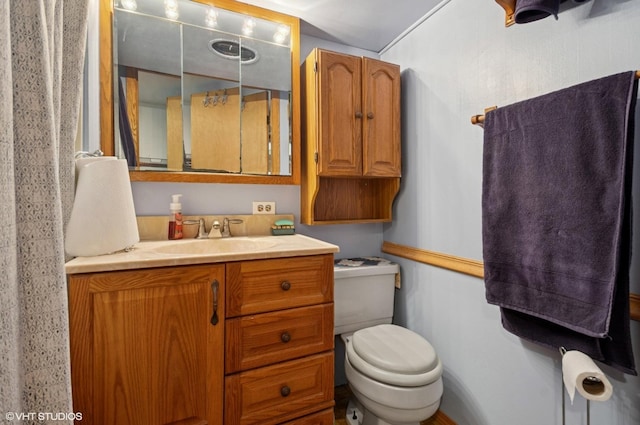 10245 Mcnerney Dr, Franklin Park, IL 60131 - bathroom featuring toilet and vanity