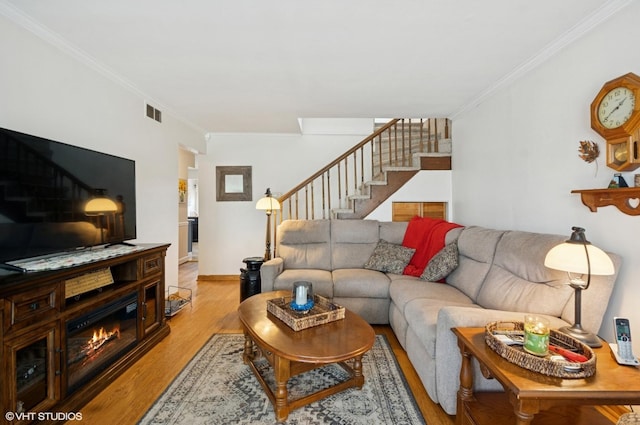 10245 Mcnerney Dr, Franklin Park, IL 60131 - living area with stairway, crown molding, and light wood-type flooring