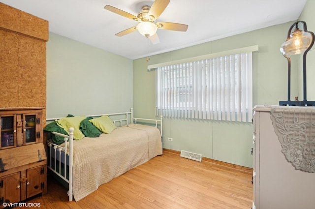 10245 Mcnerney Dr, Franklin Park, IL 60131 - bedroom featuring light wood-style floors and ceiling fan