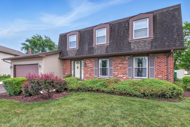 1021 Mobile Cir, Elk Grove Village, IL 60007 - view of front of property with roof with shingles, mansard roof, brick siding, a garage, and a front lawn
