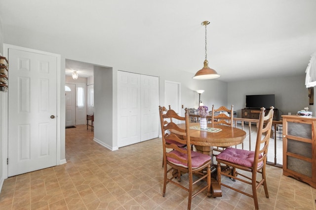 1021 Mobile Cir, Elk Grove Village, IL 60007 - dining area featuring baseboards