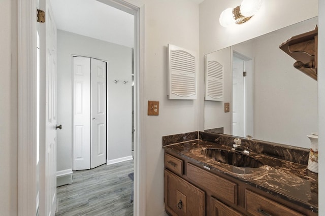 1021 Mobile Cir, Elk Grove Village, IL 60007 - bathroom with vanity and wood finished floors