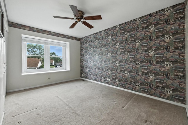 1021 Mobile Cir, Elk Grove Village, IL 60007 - carpeted spare room with ceiling fan and wallpapered walls