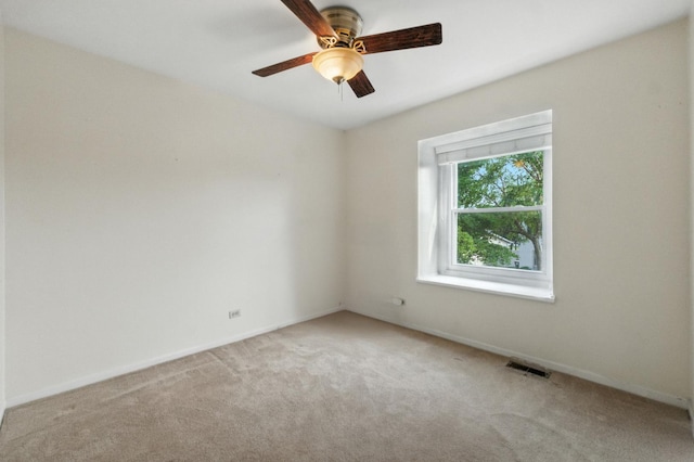 1021 Mobile Cir, Elk Grove Village, IL 60007 - carpeted empty room featuring baseboards and a ceiling fan