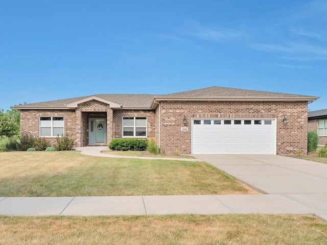 24401 S Clydesdale Ct, Manhattan, IL 60442 - ranch-style home featuring a garage, concrete driveway, brick siding, a front lawn, and roof with shingles
