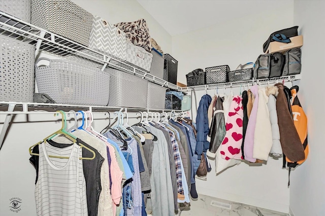 24401 S Clydesdale Ct, Manhattan, IL 60442 - walk in closet featuring marble look tile flooring