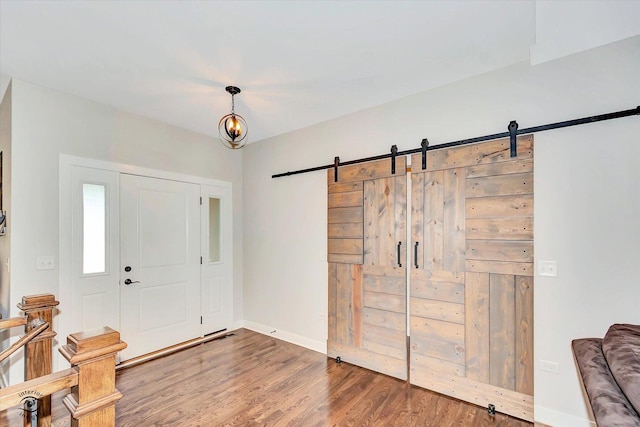 24401 S Clydesdale Ct, Manhattan, IL 60442 - entryway with a barn door and wood finished floors