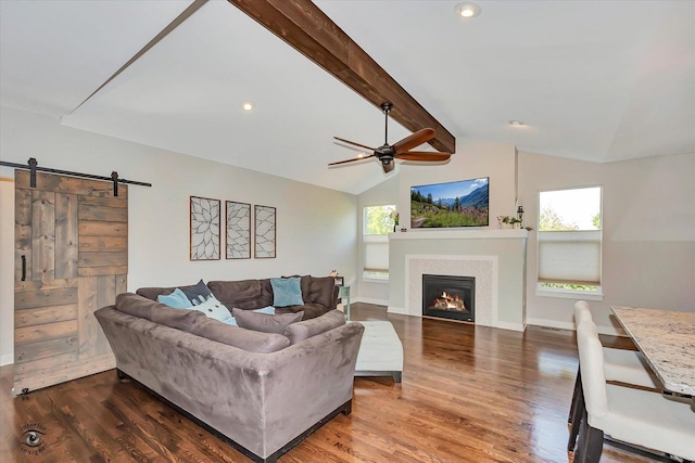 24401 S Clydesdale Ct, Manhattan, IL 60442 - living area with a ceiling fan, wood finished floors, a glass covered fireplace, recessed lighting, and a barn door