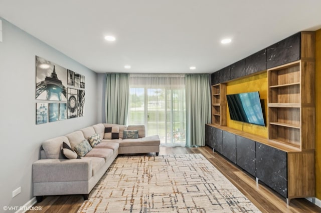 1111 Pleasant Run Dr Unit 905, Wheeling, IL 60090 - living area featuring wood finished floors and recessed lighting