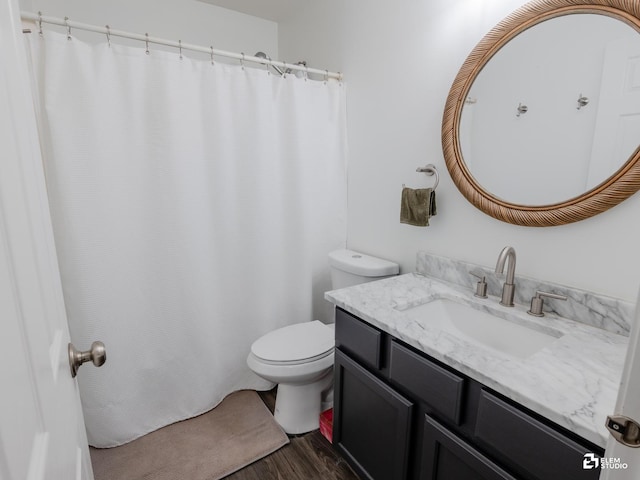 424 Grape Vine Trl, Oswego, IL 60543 - bathroom with vanity, wood finished floors, and a shower with shower curtain