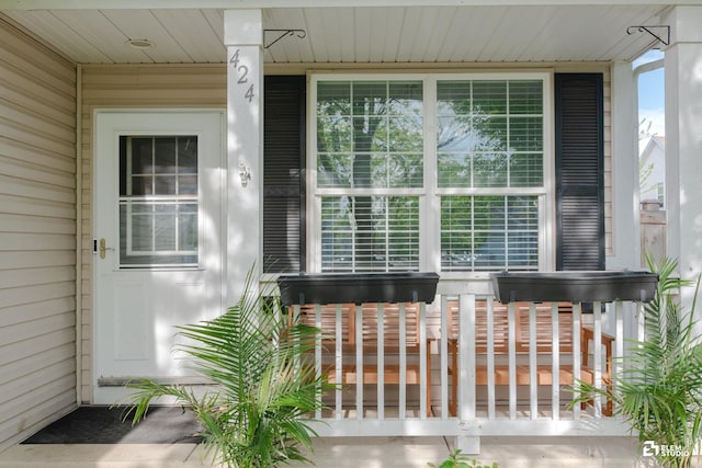 424 Grape Vine Trl, Oswego, IL 60543 - doorway to property featuring covered porch