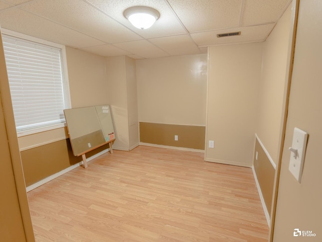 424 Grape Vine Trl, Oswego, IL 60543 - unfurnished room featuring light wood-type flooring and a paneled ceiling