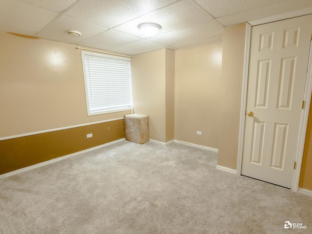 424 Grape Vine Trl, Oswego, IL 60543 - spare room featuring carpet flooring and a drop ceiling