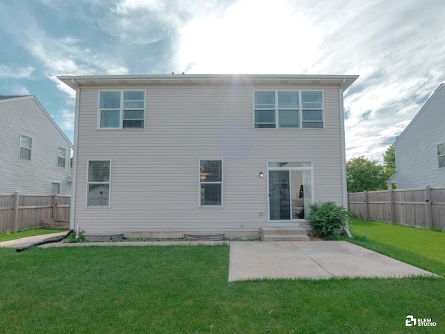424 Grape Vine Trl, Oswego, IL 60543 - back of house with a patio area, a fenced backyard, and entry steps