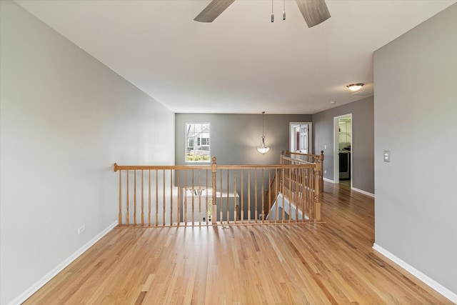 627 S Jade Ln, Round Lake, IL 60073 - unfurnished room featuring wood finished floors and a ceiling fan