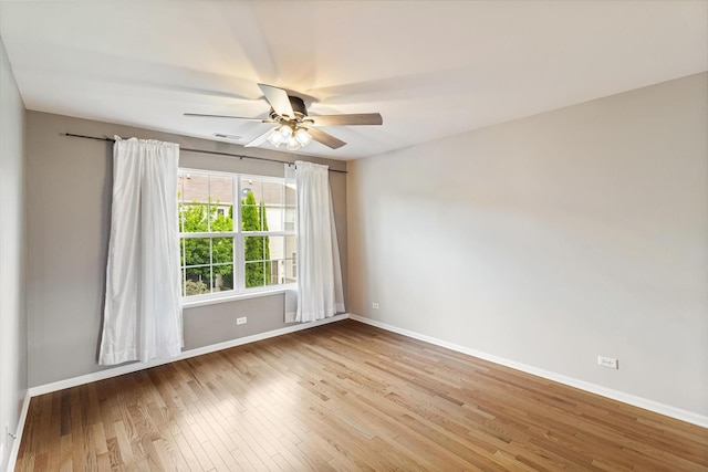 627 S Jade Ln, Round Lake, IL 60073 - empty room featuring hardwood / wood-style floors and ceiling fan