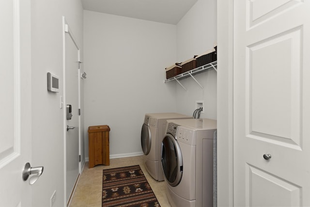 1780 Briarheath Dr, Aurora, IL 60505 - washroom with washing machine and clothes dryer and light tile patterned floors