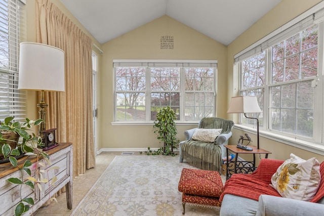 1780 Briarheath Dr, Aurora, IL 60505 - living area featuring lofted ceiling and light tile patterned floors