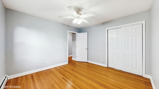 4629 Main St Unit 2A, Skokie, IL 60076 - unfurnished bedroom with a baseboard radiator, light wood finished floors, a closet, and ceiling fan