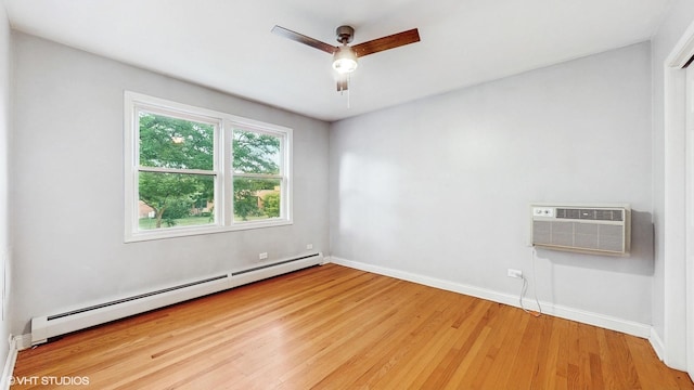 4629 Main St Unit 2A, Skokie, IL 60076 - spare room with a baseboard radiator, light wood finished floors, ceiling fan, and an AC wall unit