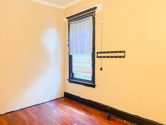 450 W 29th St, Chicago, IL 60616 - spare room featuring wood finished floors and crown molding