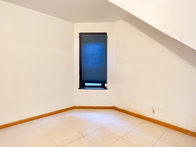 450 W 29th St, Chicago, IL 60616 - bonus room featuring baseboards and light tile patterned floors