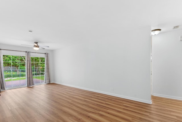 5475 Adeline Pl, Oak Forest, IL 60452 - unfurnished room featuring a ceiling fan and light wood-style flooring