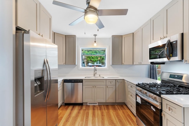 5475 Adeline Pl, Oak Forest, IL 60452 - kitchen featuring appliances with stainless steel finishes, ceiling fan, light wood-style flooring, and gray cabinets