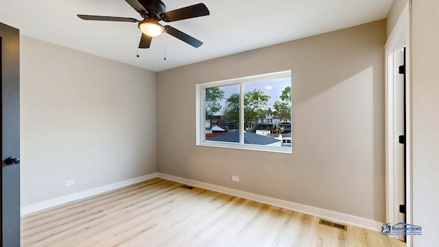 300 N Lockwood Ave, Chicago, IL 60644 - empty room with wood finished floors and a ceiling fan
