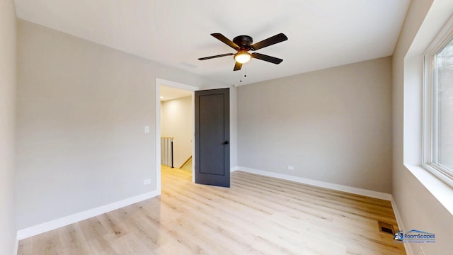 300 N Lockwood Ave, Chicago, IL 60644 - spare room featuring light wood-style floors and ceiling fan
