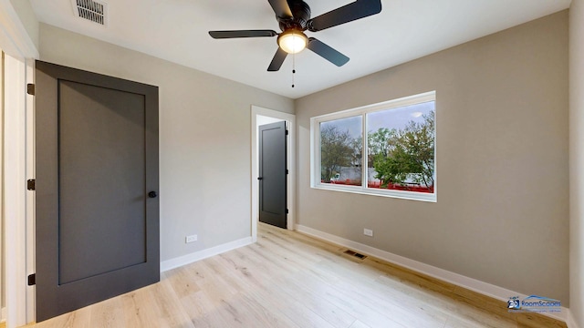 300 N Lockwood Ave, Chicago, IL 60644 - unfurnished bedroom featuring wood finished floors and ceiling fan